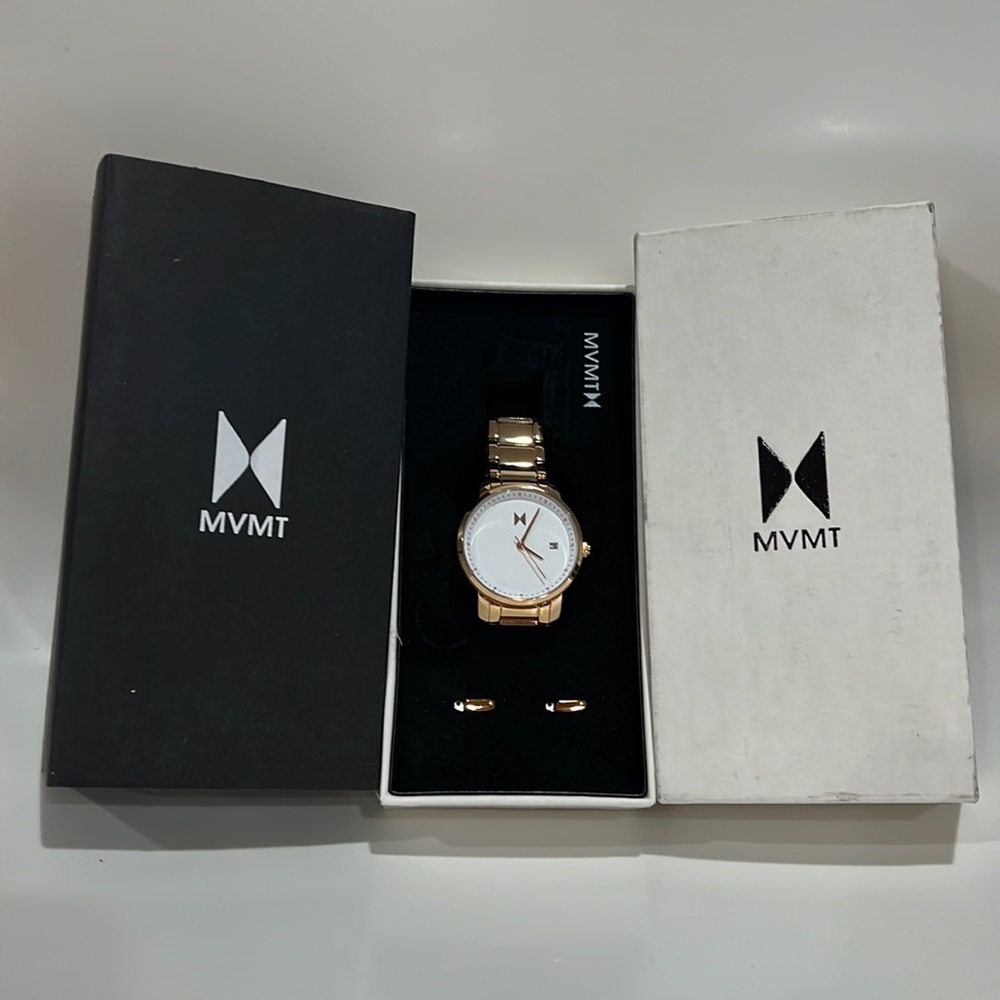 Women MVMT gold Watch. Flawless; needs battery